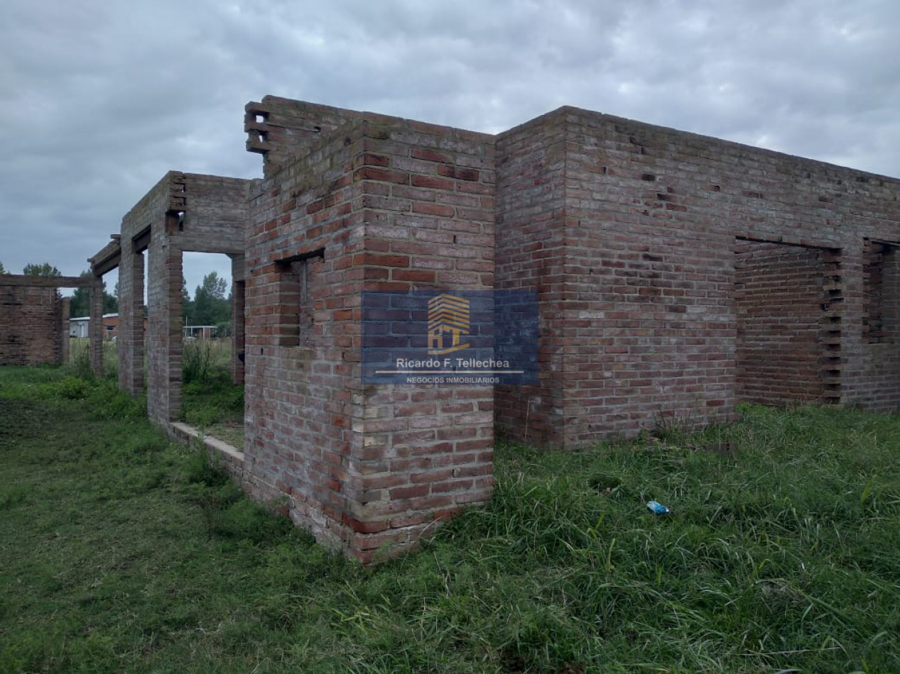 LOTE CON CASA A CONSTRUIR